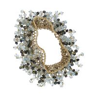 Pulsera en oro amarillo con bolitas de topacios y zafiros.