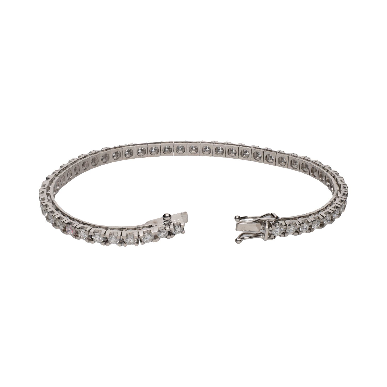 Pulsera riviere en oro blanco con brillantes.