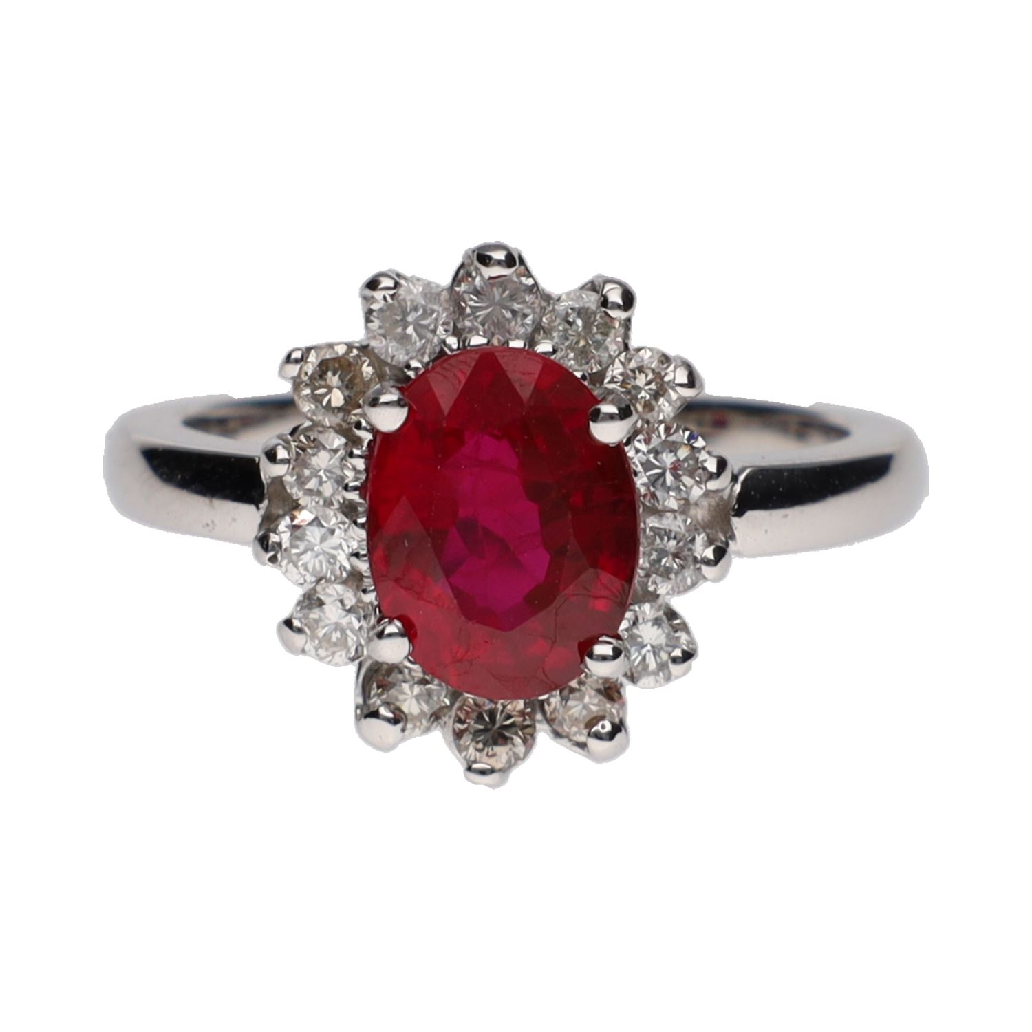 Sortija en oro blanco con rubí y orla de brillantes. Talla 13.