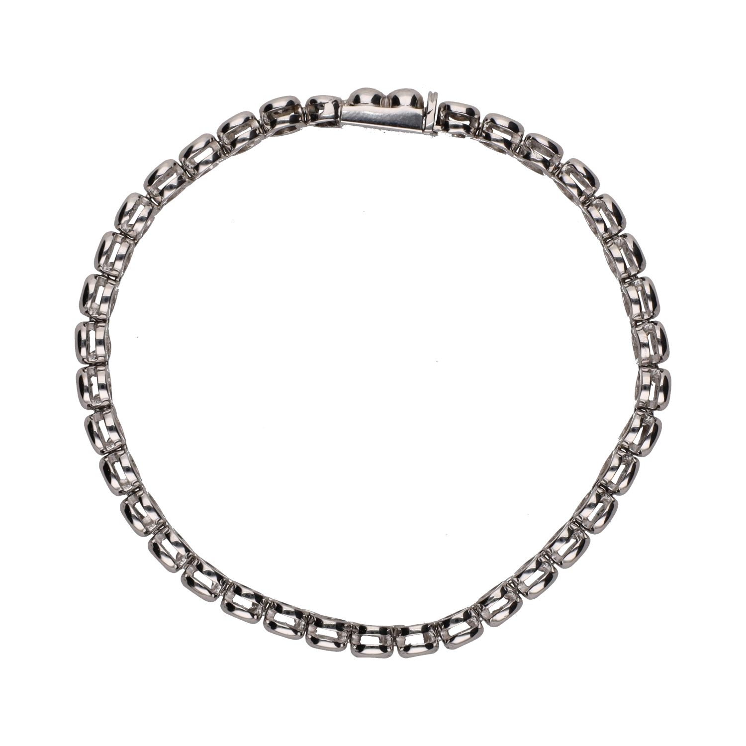 Pulsera riviere en oro blanco con brillantes en chatón.