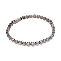 Pulsera riviere en oro blanco con brillantes en chatón.