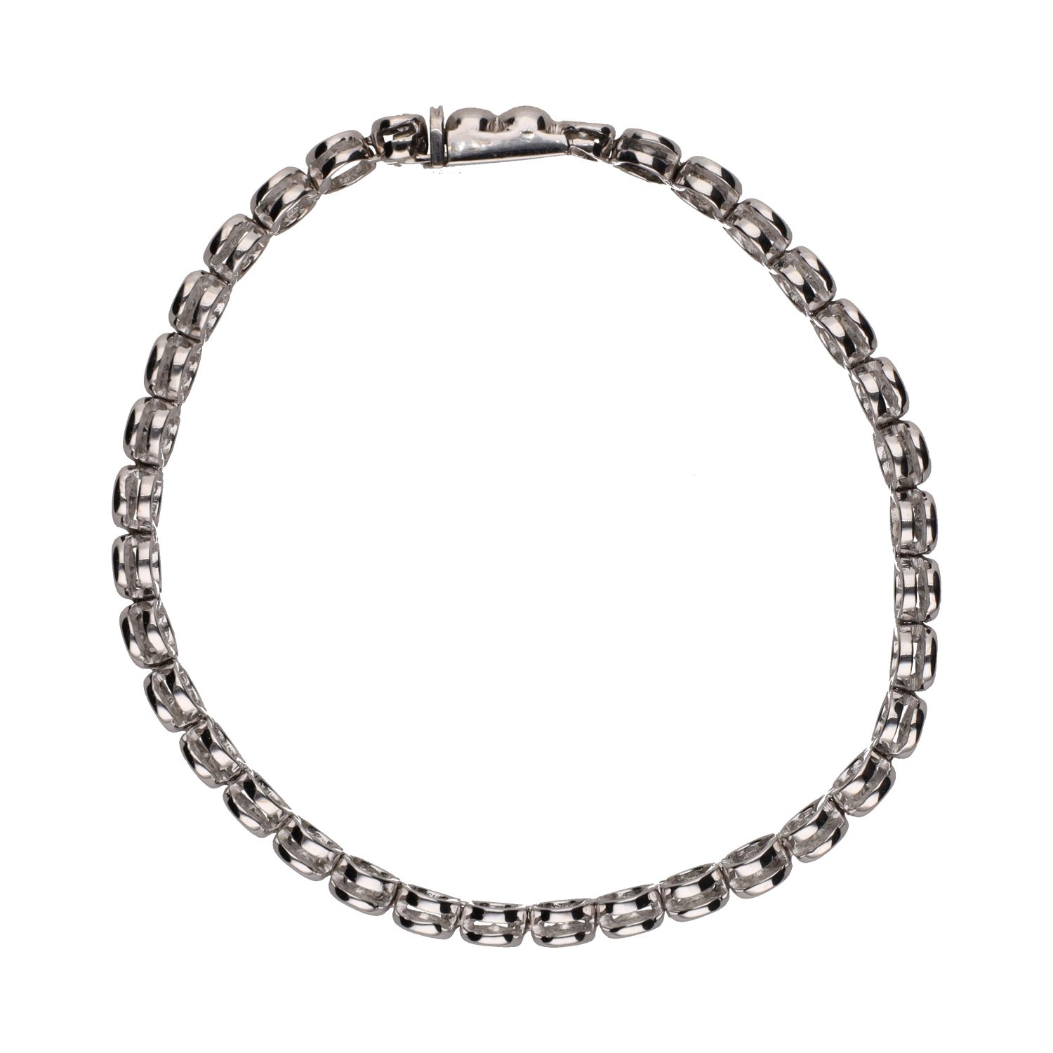 Pulsera riviere en oro blanco con brillantes en chatón.