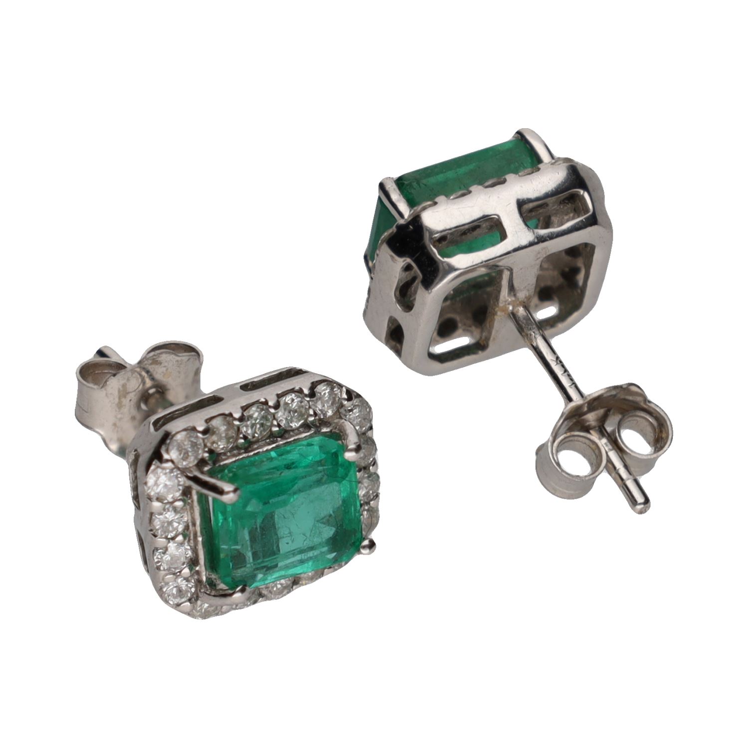 Pendientes en oro blanco con esmeraldas y brillantes.