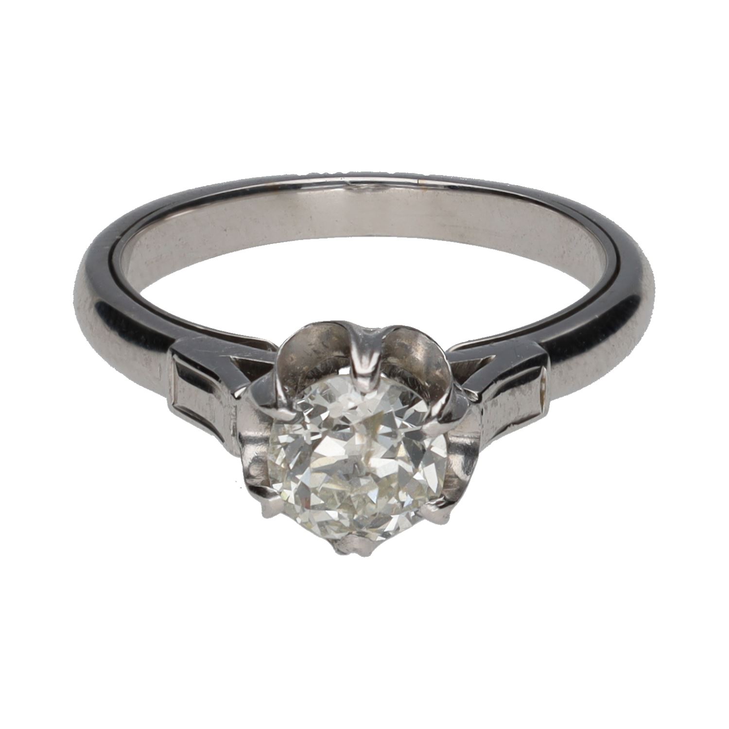 Solitario en oro blanco con un brillante. Talla 14.