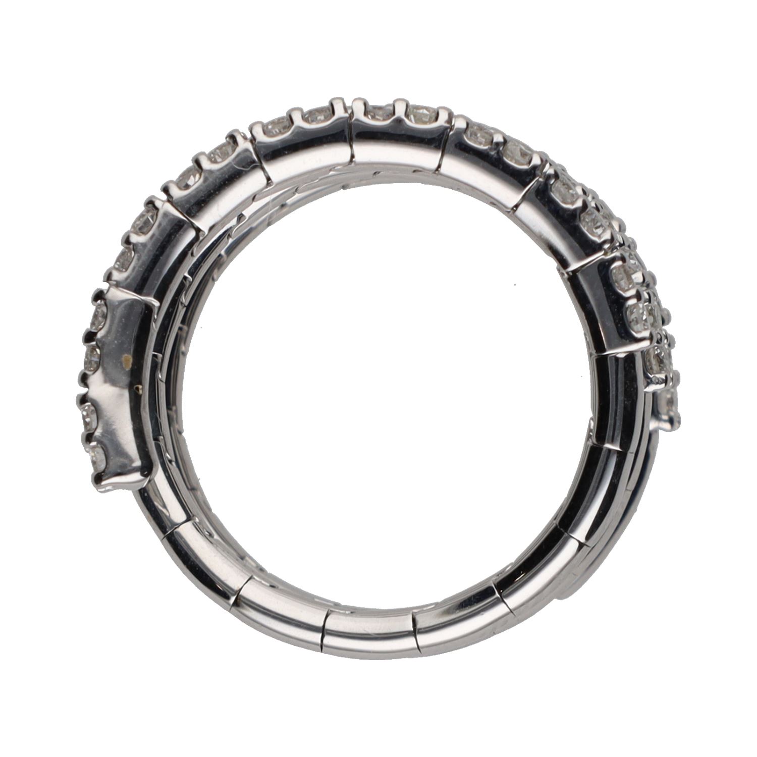 Sortija  tipo muelle en oro blanco con brillantes. Talla 14