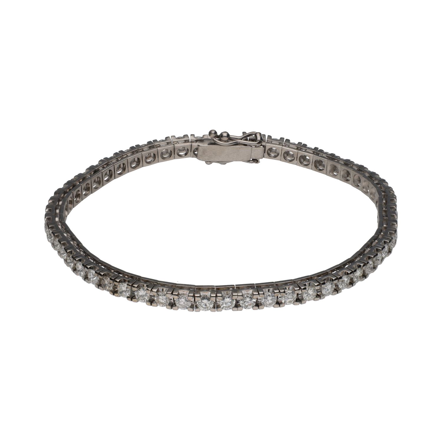 Pulsera riviere en oro blanco con brillantes.