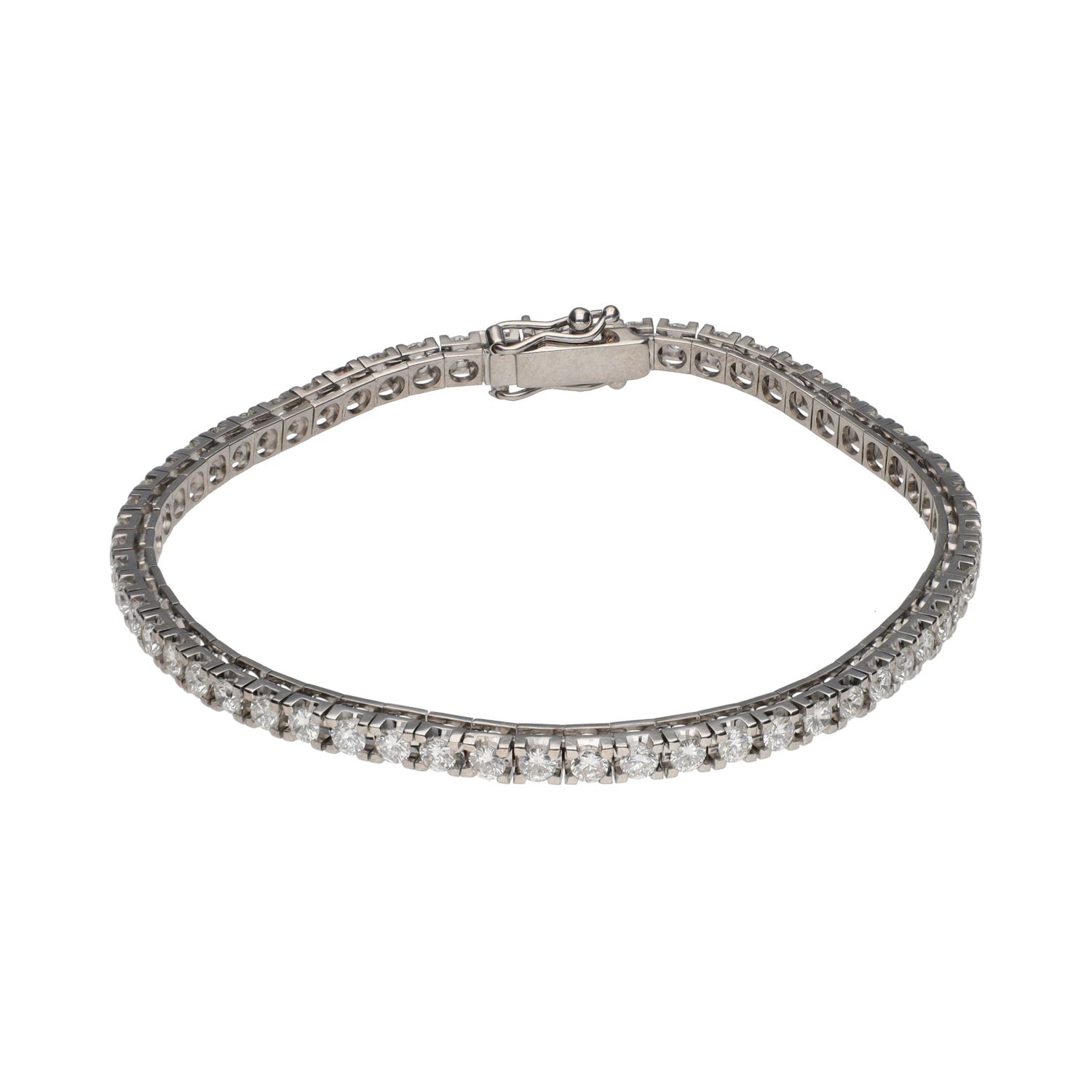 Pulsera riviere en oro blanco con brillantes.