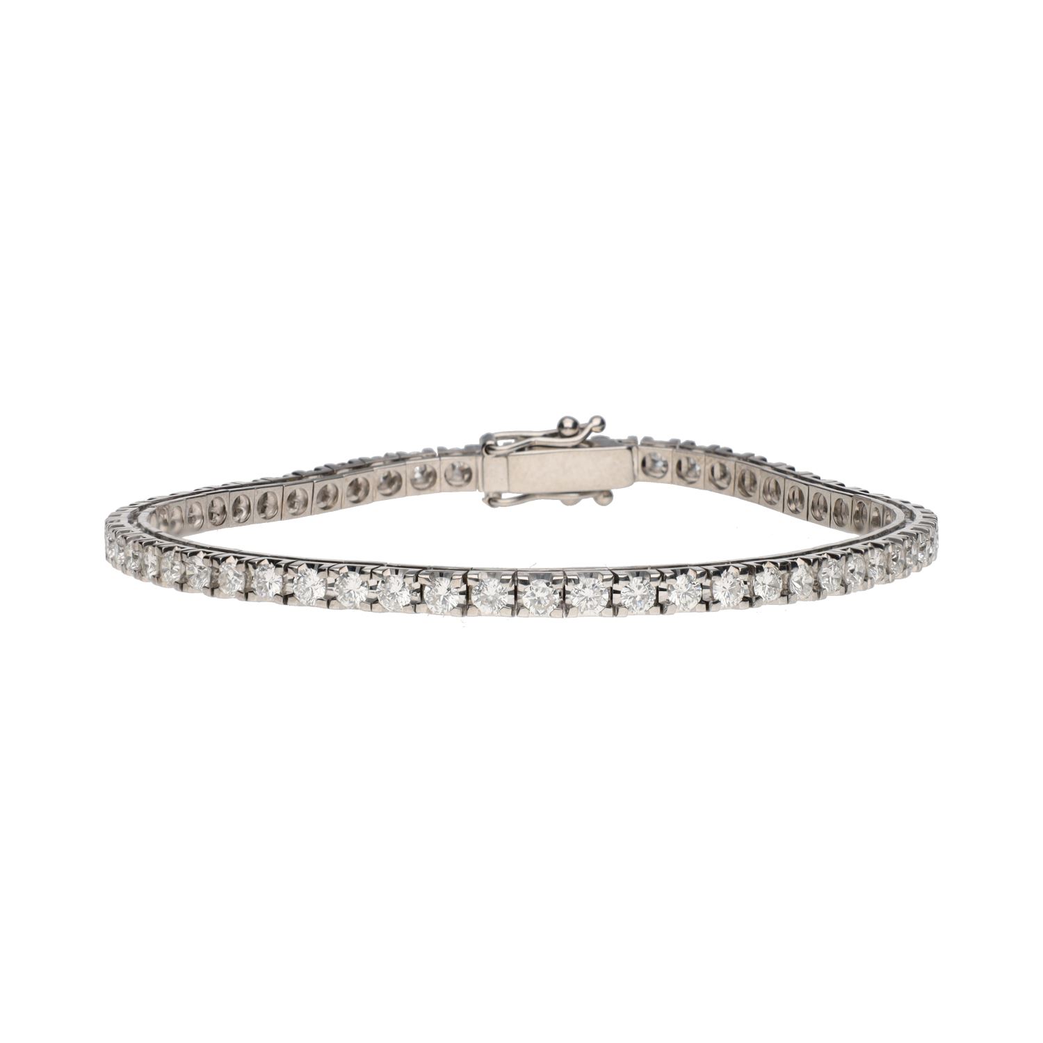 Pulsera riviere en oro blanco con brillantes.