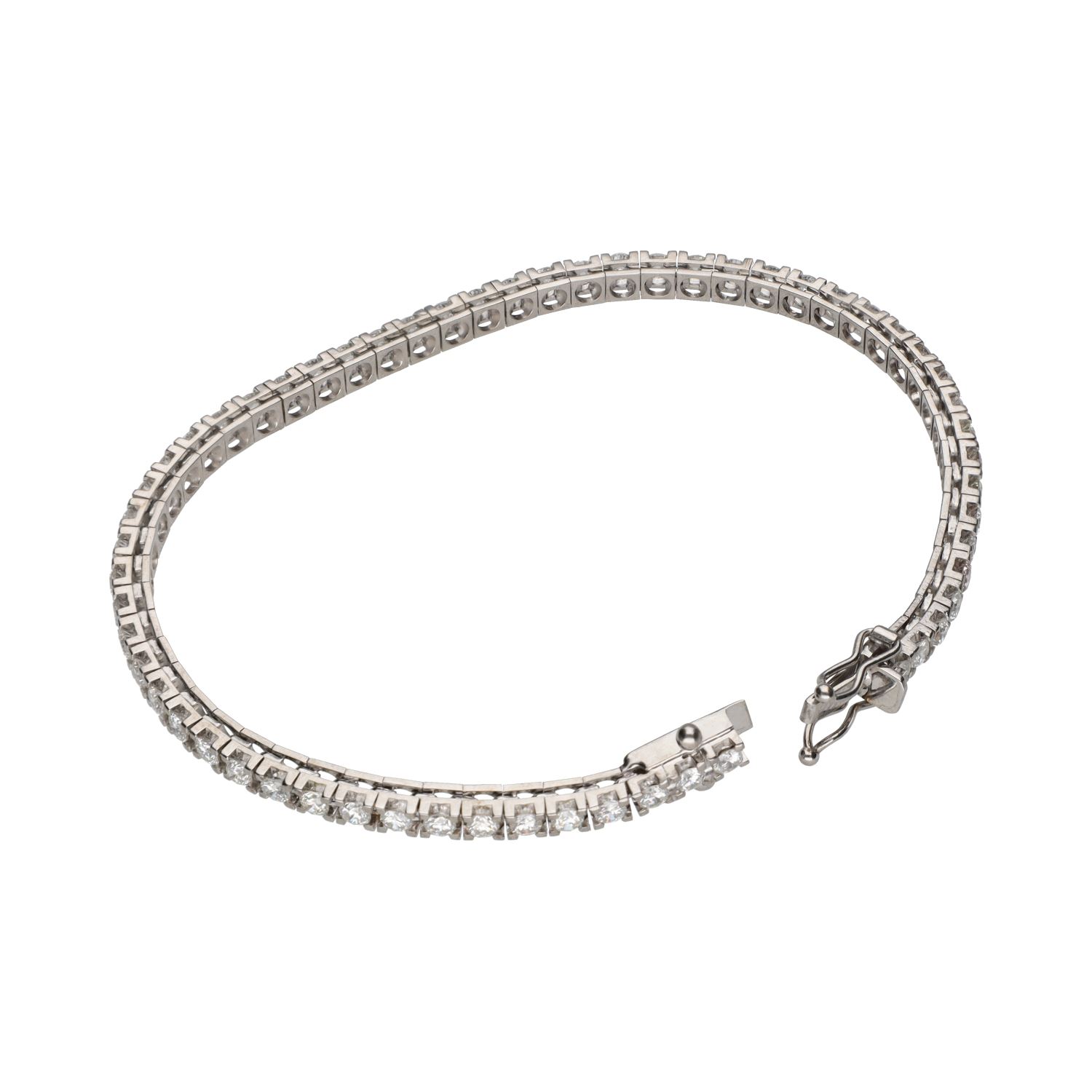 Pulsera riviere en oro blanco con brillantes.