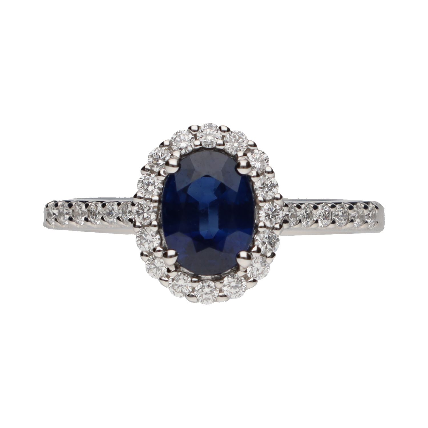 Sortija en oro blanco con zafiro central y brillantes en orla y brazos. Talla 15.