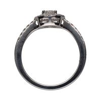 Sortija solitario en oro blanco con brillantes. Talla 12.