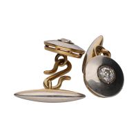 Botonadura en oro blanco y oro amarillo con diamantes.