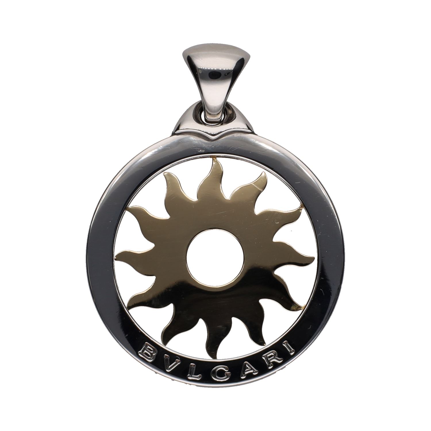 Colgante sol de bulgari en acero y oro.