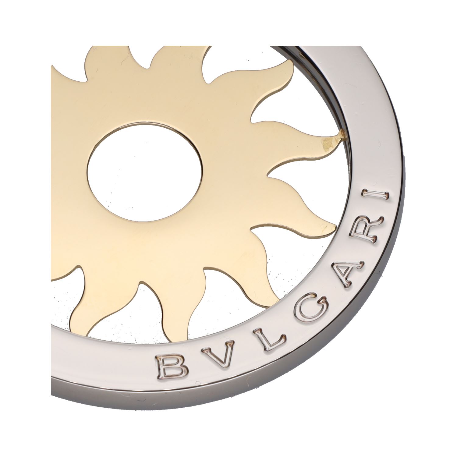 Colgante sol de bulgari en acero y oro.