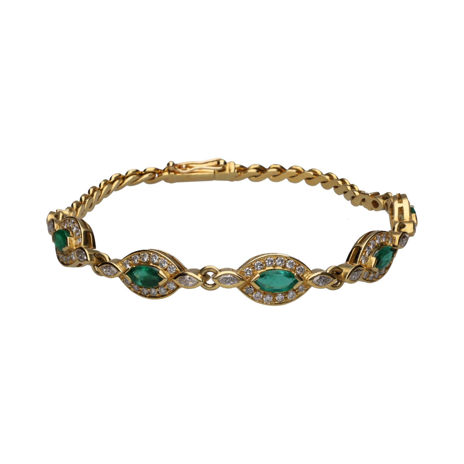 Pulsera en oro amarillo con esmeraldas y brillantes.