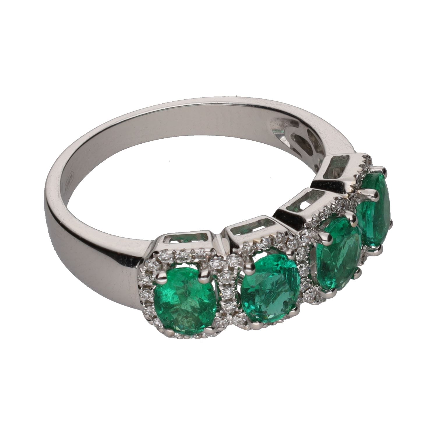Sortija en oro blanco con esmeraldas y brillantes. Talla 14.