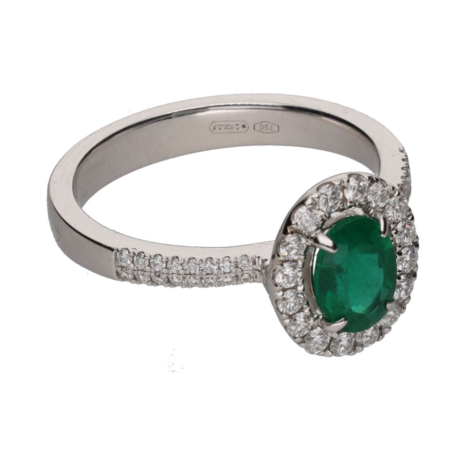 Sortija en oro blanco con esmeralda y orla de brillantes. Talla 14.