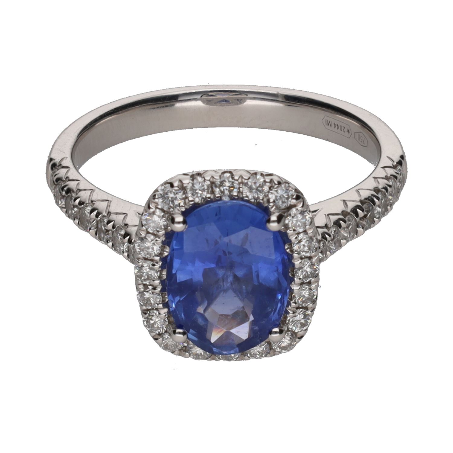 Sortija en oro blanco con un zafiro y brillantes. Talla 14.