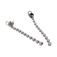 Pendientes en oro blanco con brillantes en chatón.