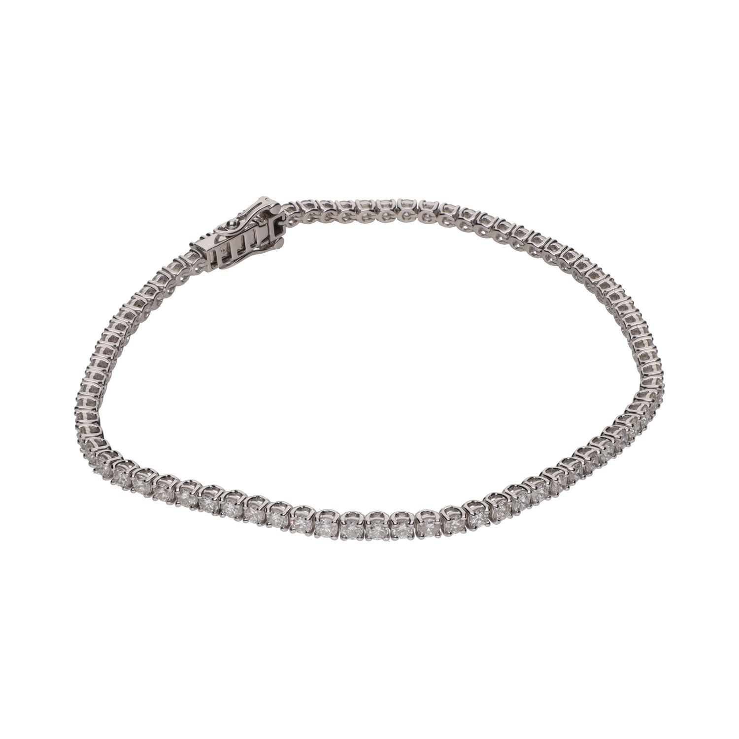 Pulsera riviere en oro blanco con brillantes.