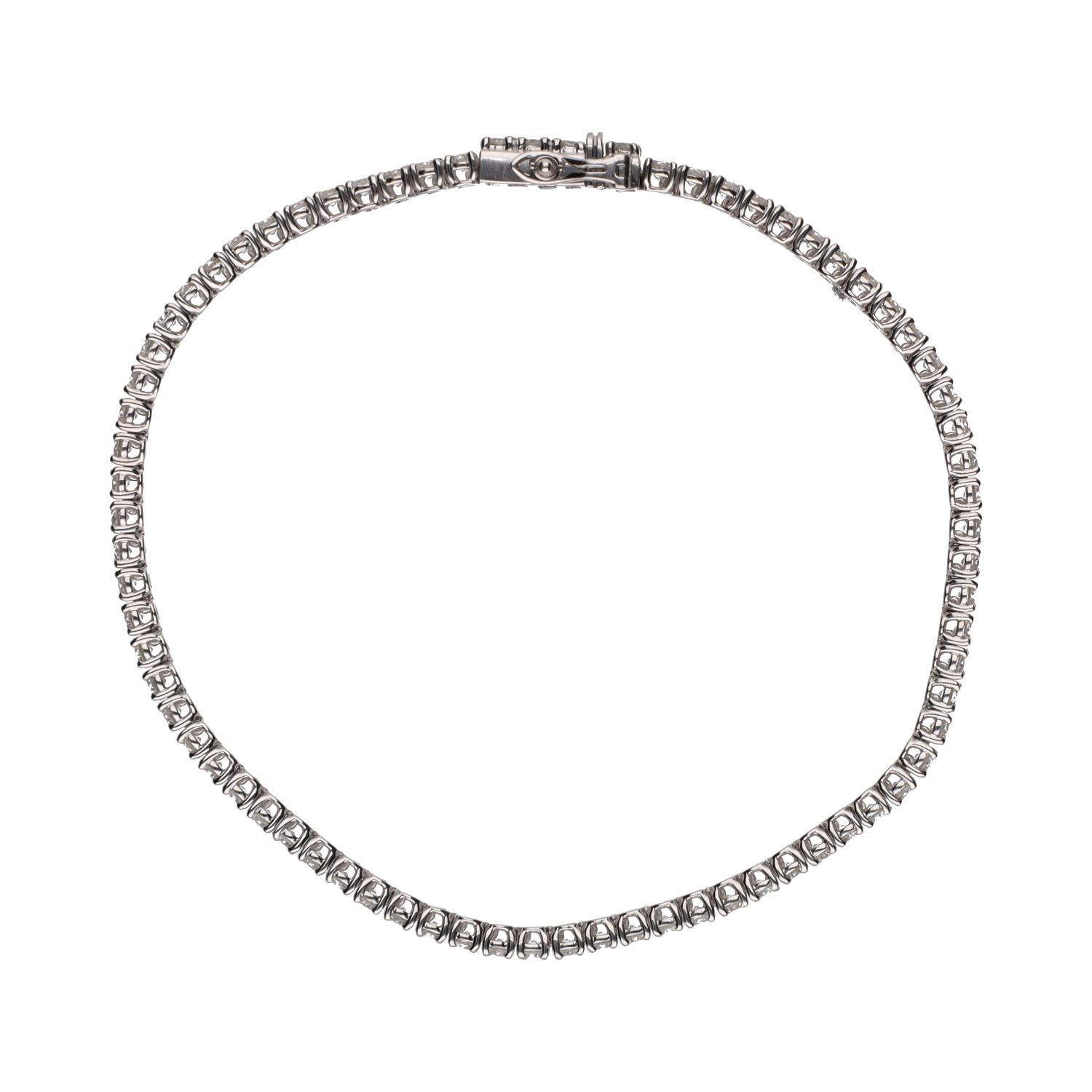 Pulsera riviere en oro blanco con brillantes.