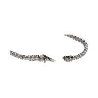 Pulsera riviere en oro blanco con brillantes.