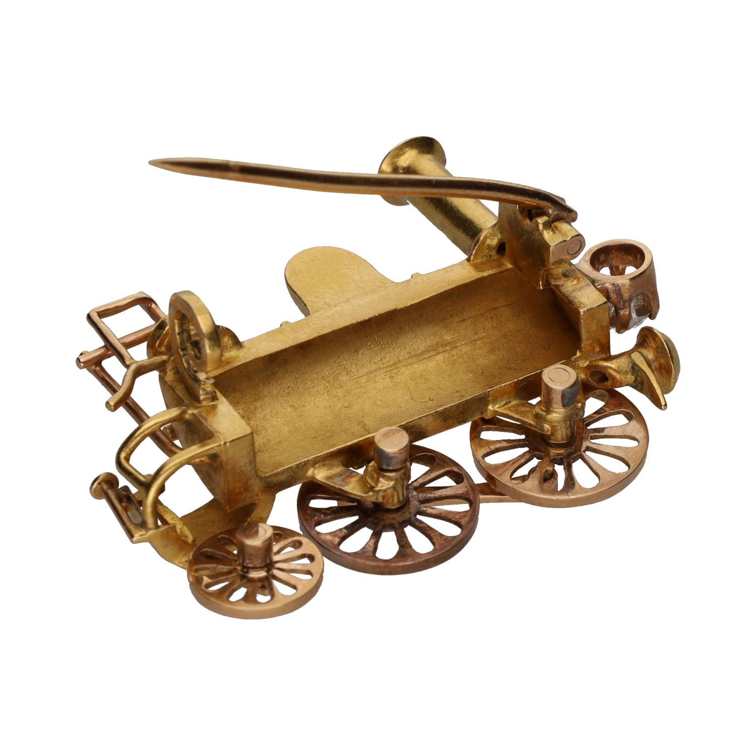 Broche  s-xix en forma de locomotora en oro amarillo con diamantes.