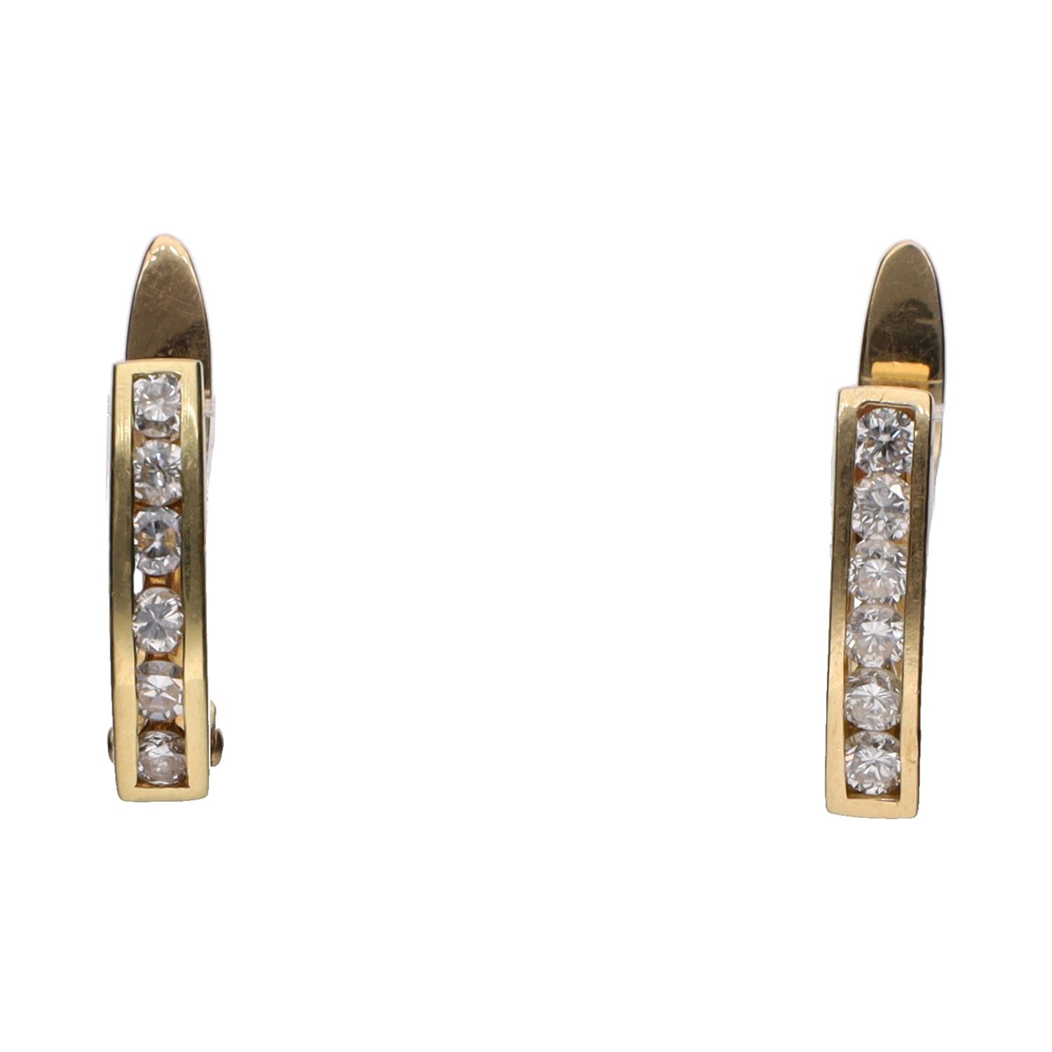 Pendientes en oro amarillo y brillantes.
