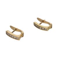 Pendientes en oro amarillo y brillantes.