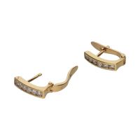 Pendientes en oro amarillo y brillantes.
