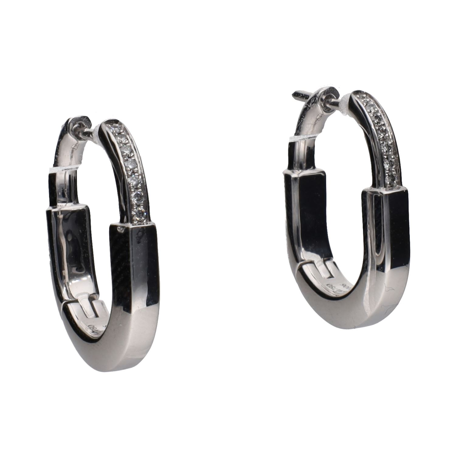 Pendientes lock de tiffany en oro blanco con brillantes.