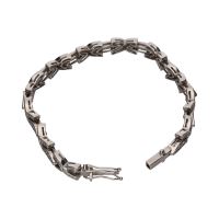 Pulsera en oro blanco con brillantes.