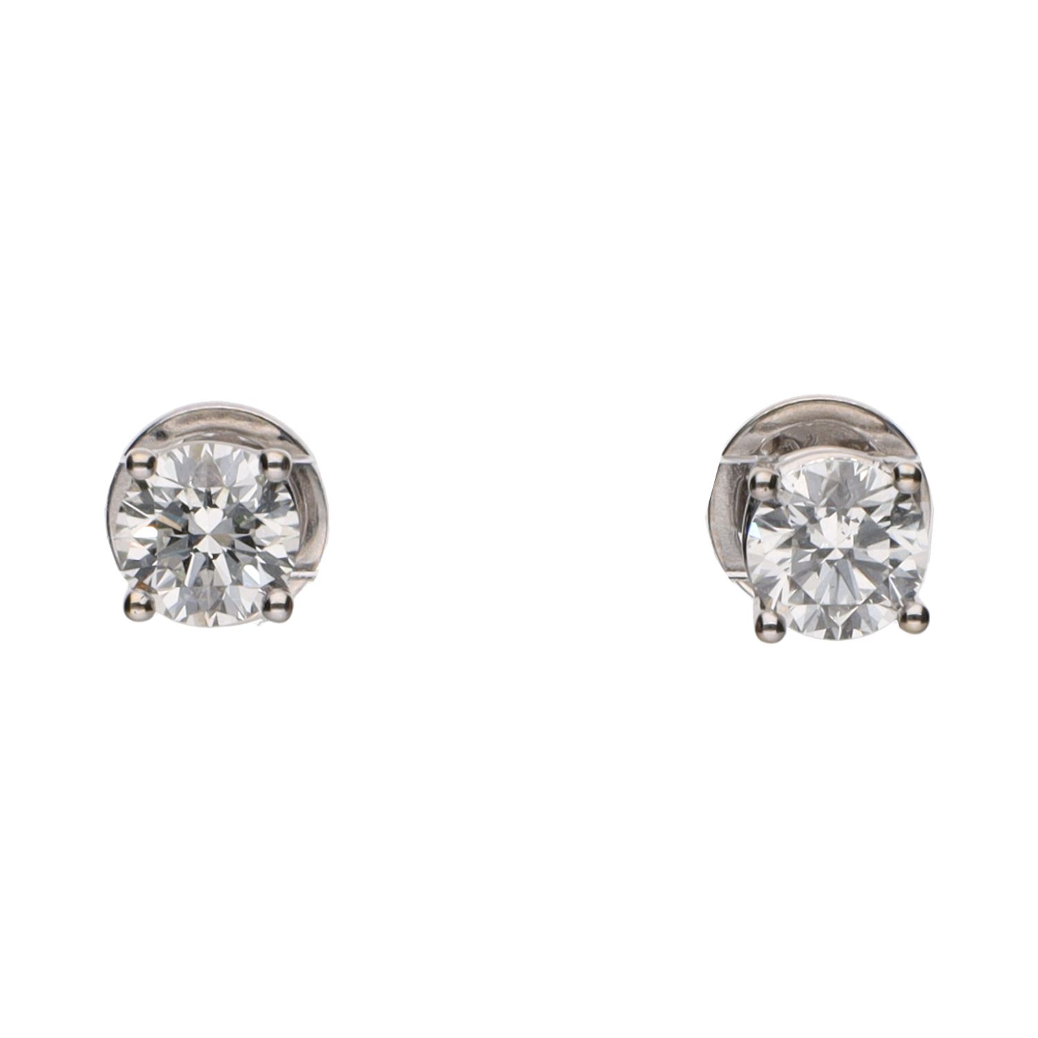 Pendientes dormilonas en oro blanco con brillantes.