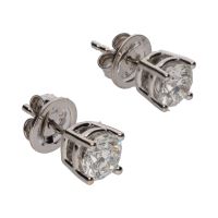 Pendientes dormilonas en oro blanco con brillantes.