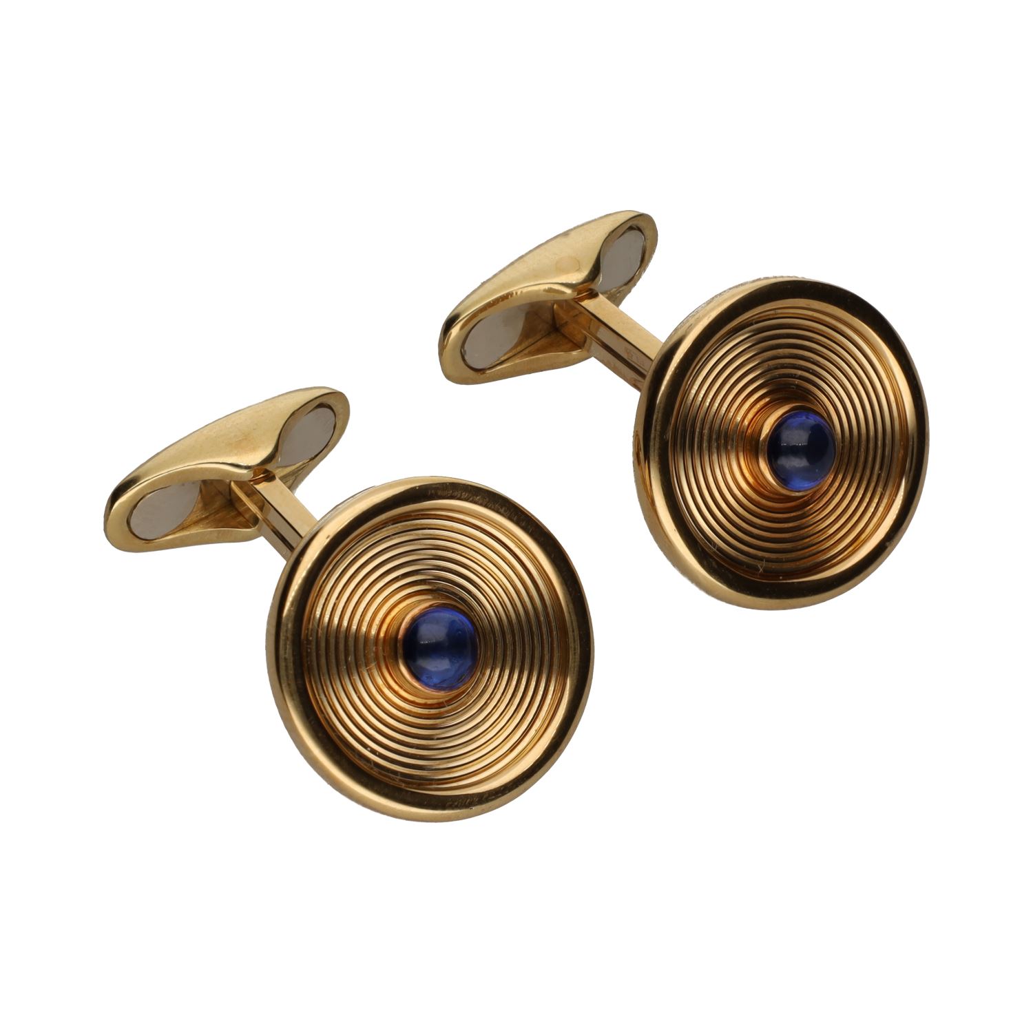 Gemelos firmados por suarez en oro amarillo con zafiros.