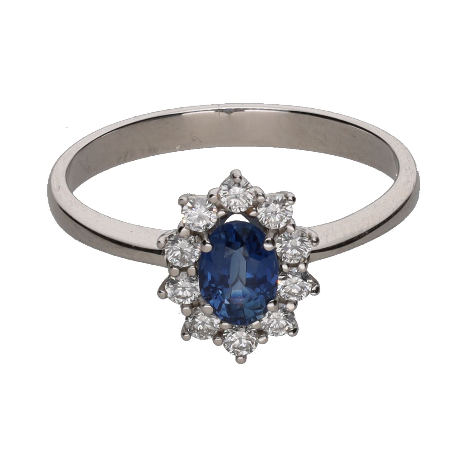 Sortija en oro blanco con zafiro y orla de brillantes. Talla 13.