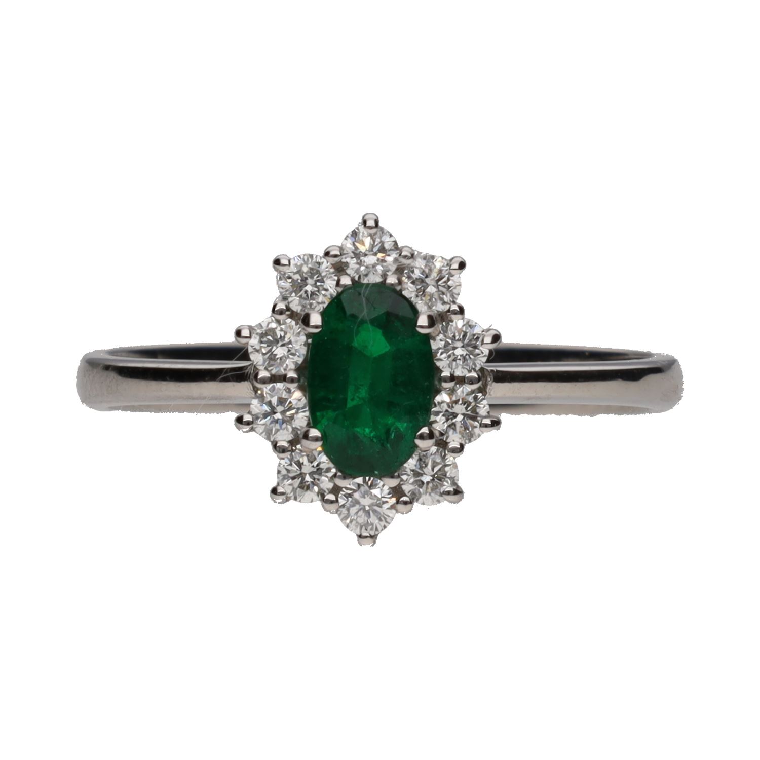 Sortija en oro blanco con esmeralda y orla de brillantes. Talla 14.