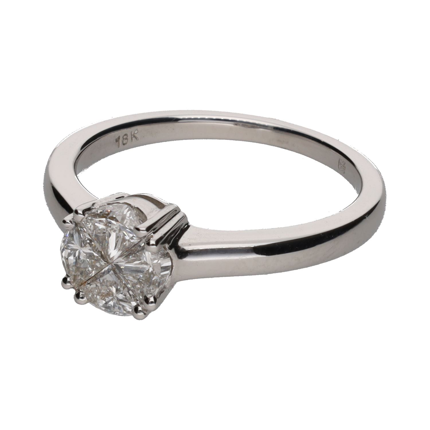 Sortija en oro blanco con cuatro brillantes. Talla 14.