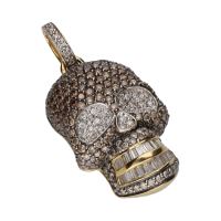 Colgante calavera en oro amarillo con brillantes.