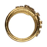 Sortija tipo muelle en oro amarillo con brillantes.