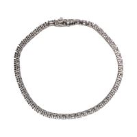 Pulsera riviere en oro blanco con brillantes.