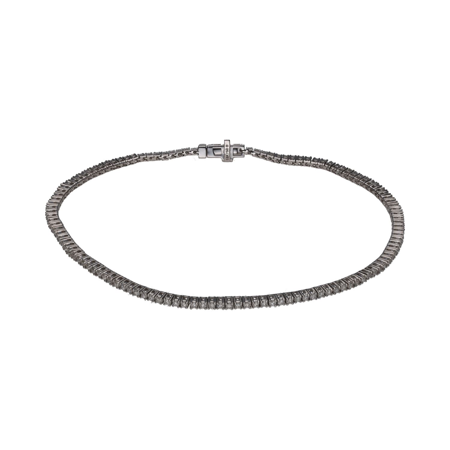 Pulsera riviere en oro blanco con brillantes.