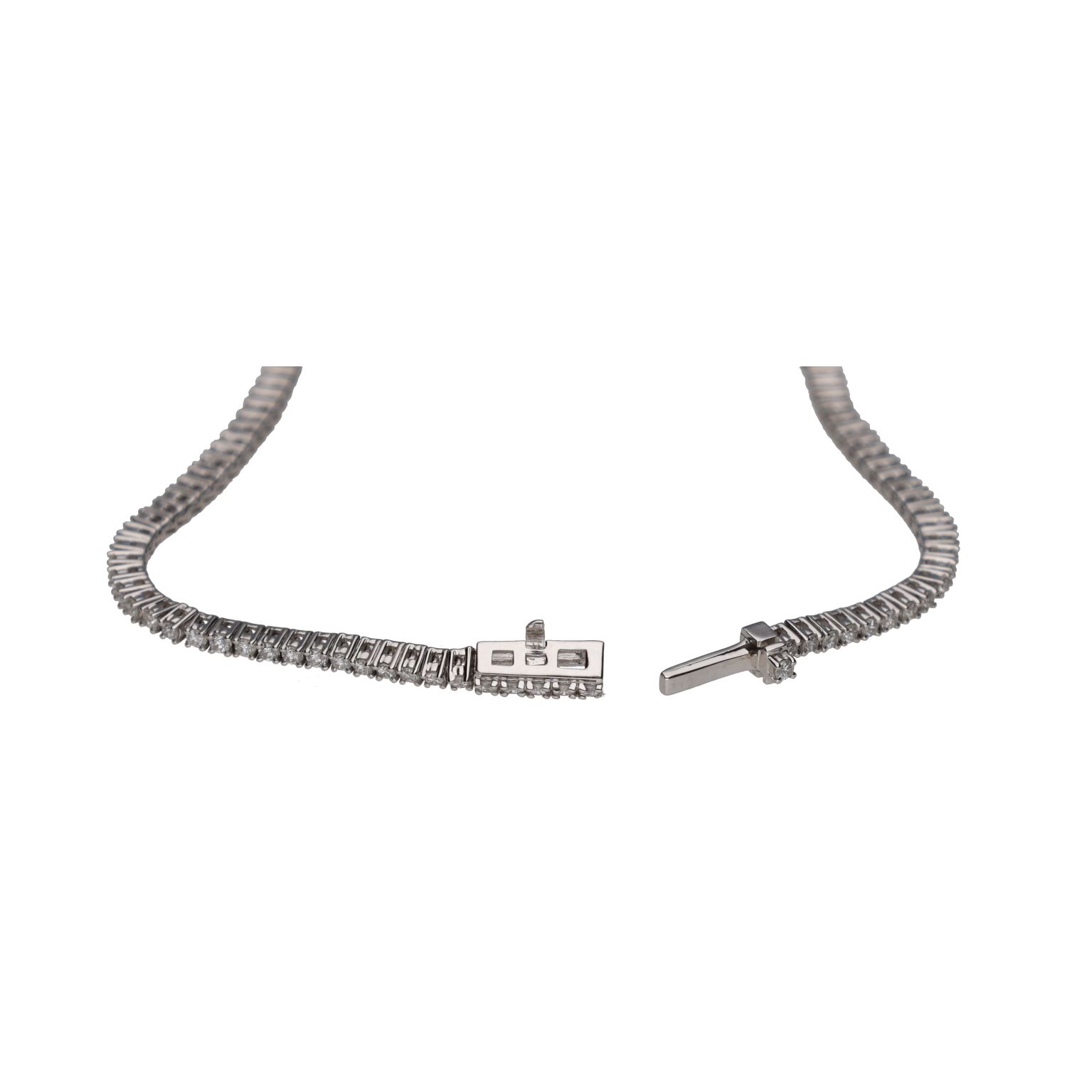 Pulsera riviere en oro blanco con brillantes.