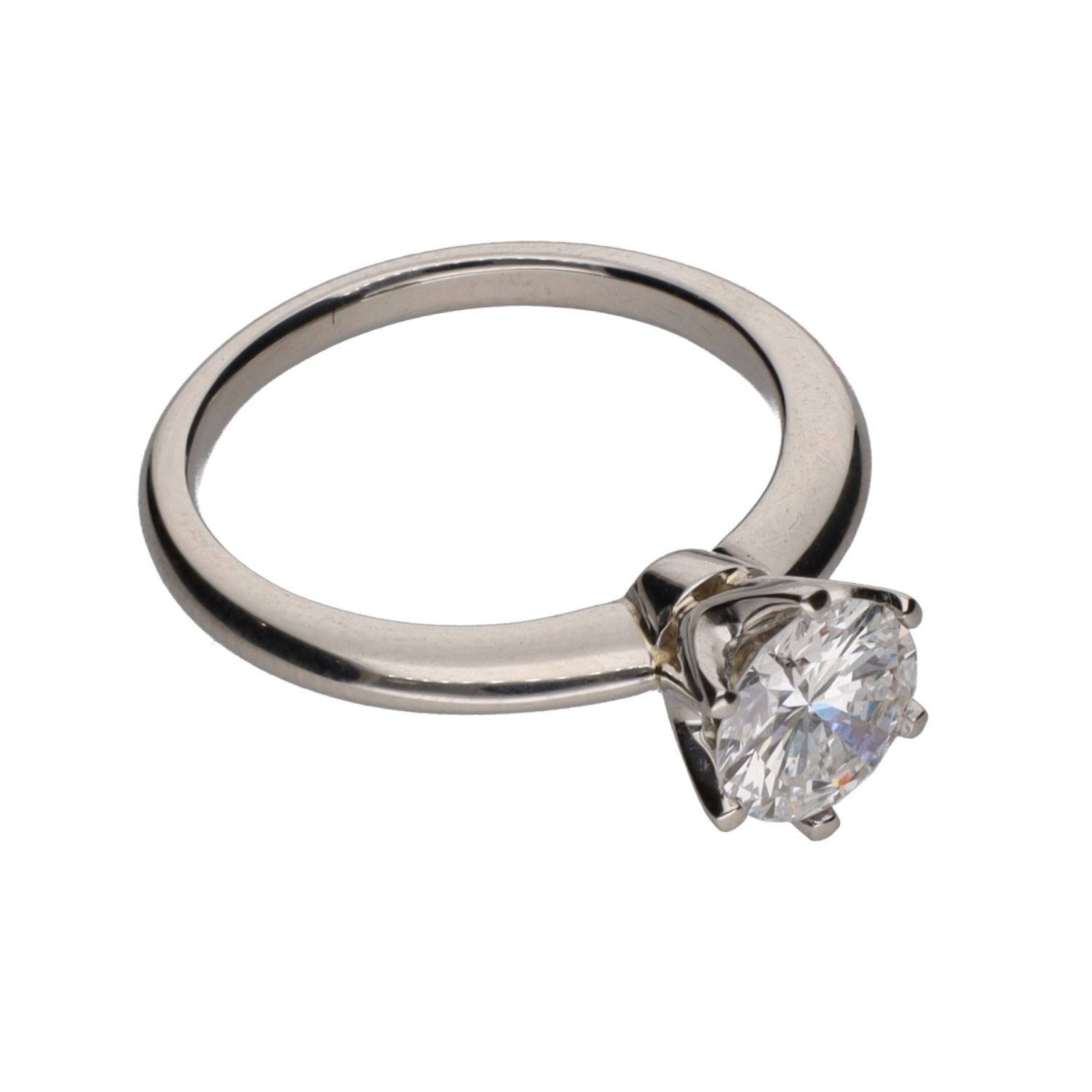 Sortija solitario en oro blanco con un brillante. Talla 12.
