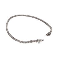 Pulsera riviere en oro blanco con brillantes.