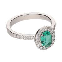 Sortija en oro blanco con esmeralda y brillantes. Talla 14.