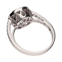 Sortija en oro blanco con rubíes y diamantes. Talla 14.