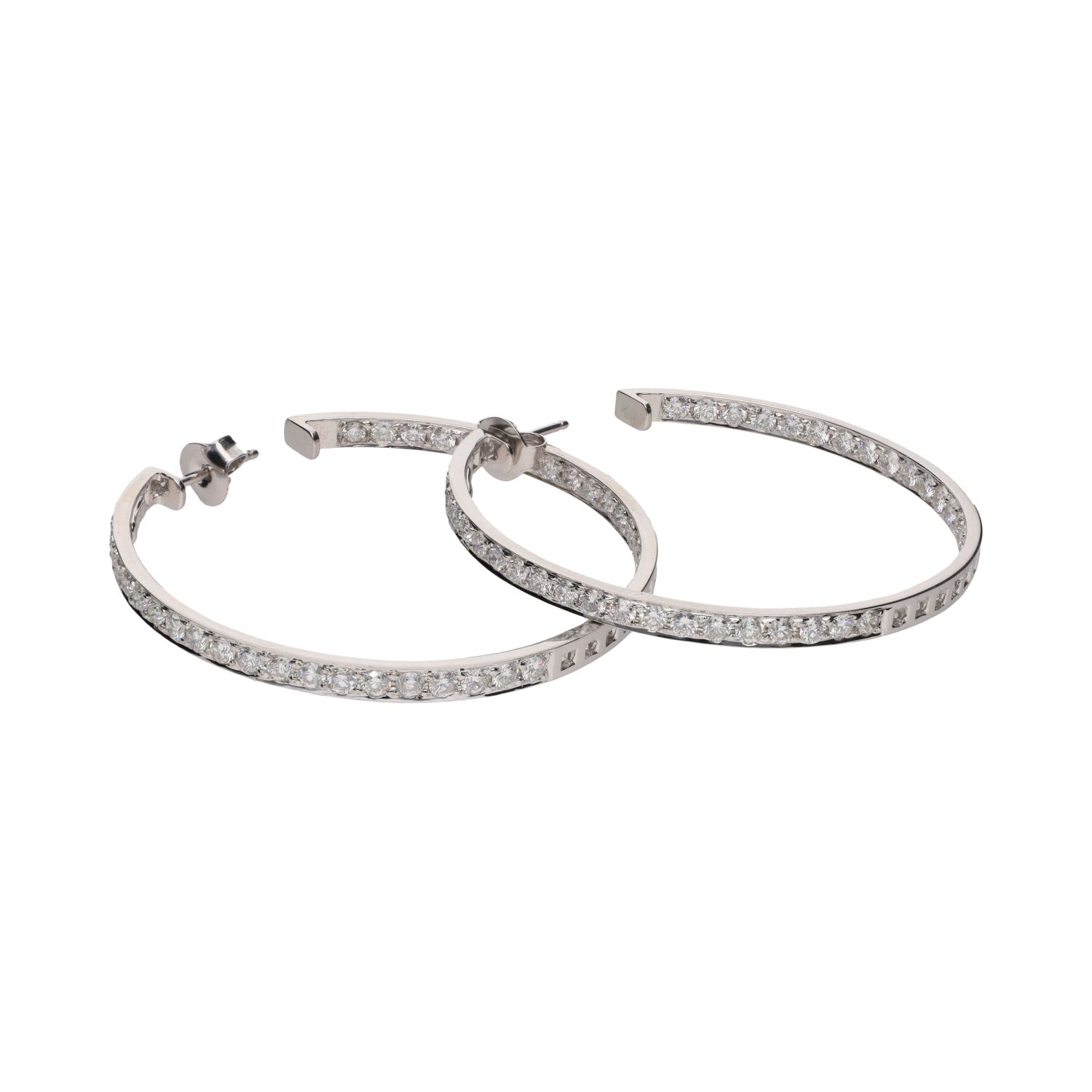 Pendientes argollas firmados por suarez en oro blanco con brillantes.