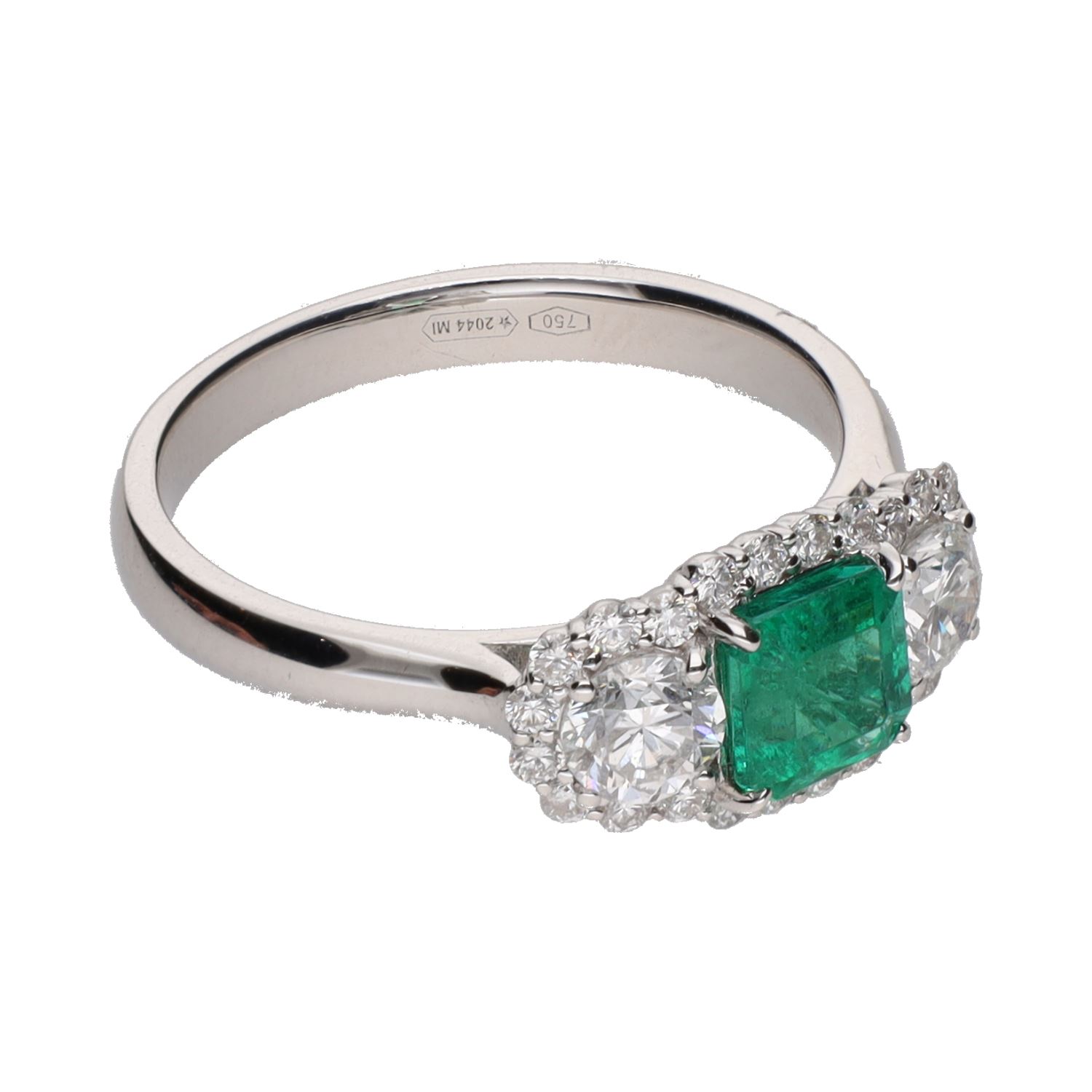 Sortija en oro blanco con esmeralda y brillantes. Talla 14.