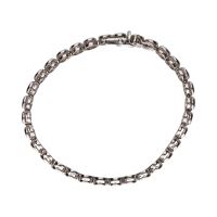 Pulsera riviere en oro blanco con brillantes en chatón.